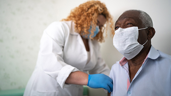 Someone receiving the vaccine